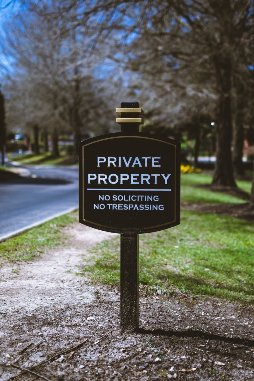 black and white private property signage