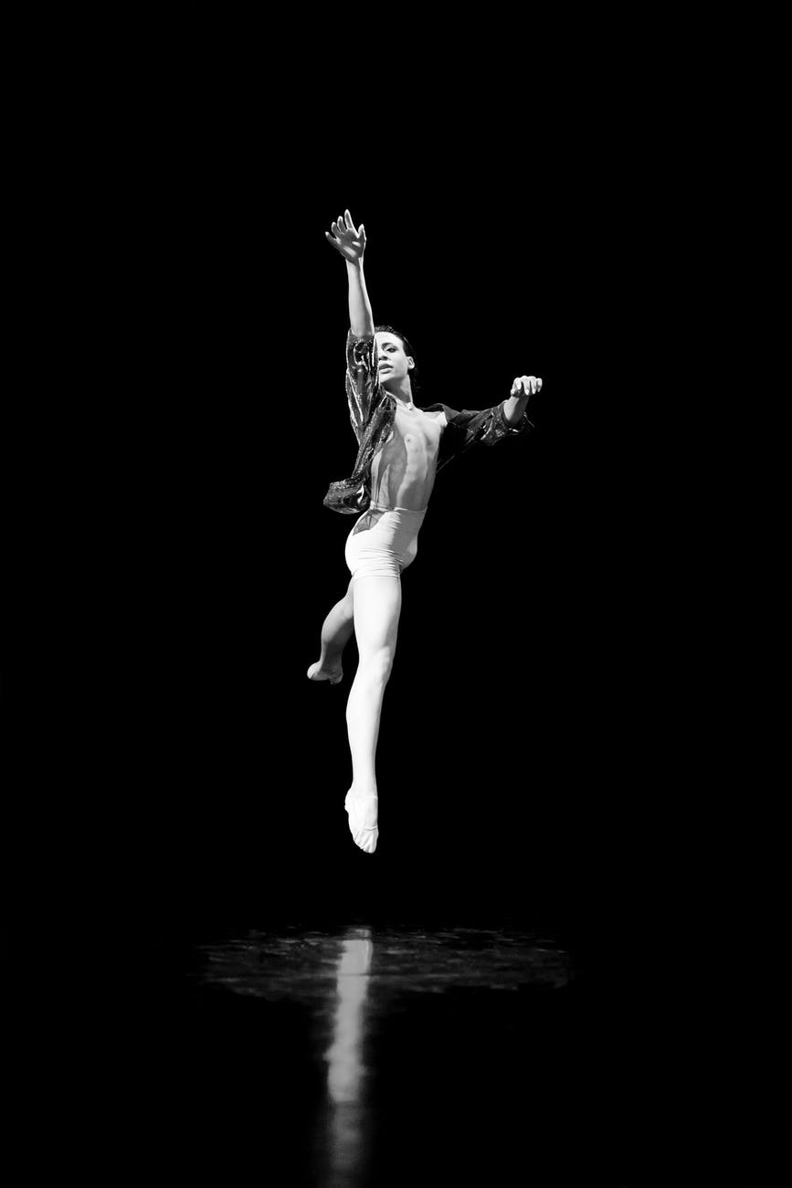 man performing ballet on stage